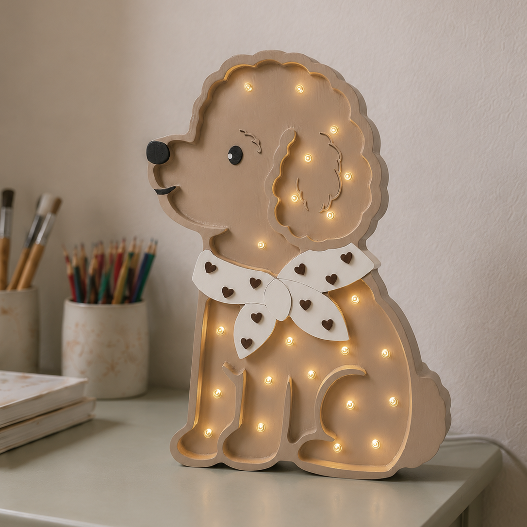 Little Lights Poodle Dog Kids lamp with beige scarf sitting on the desk in kids room