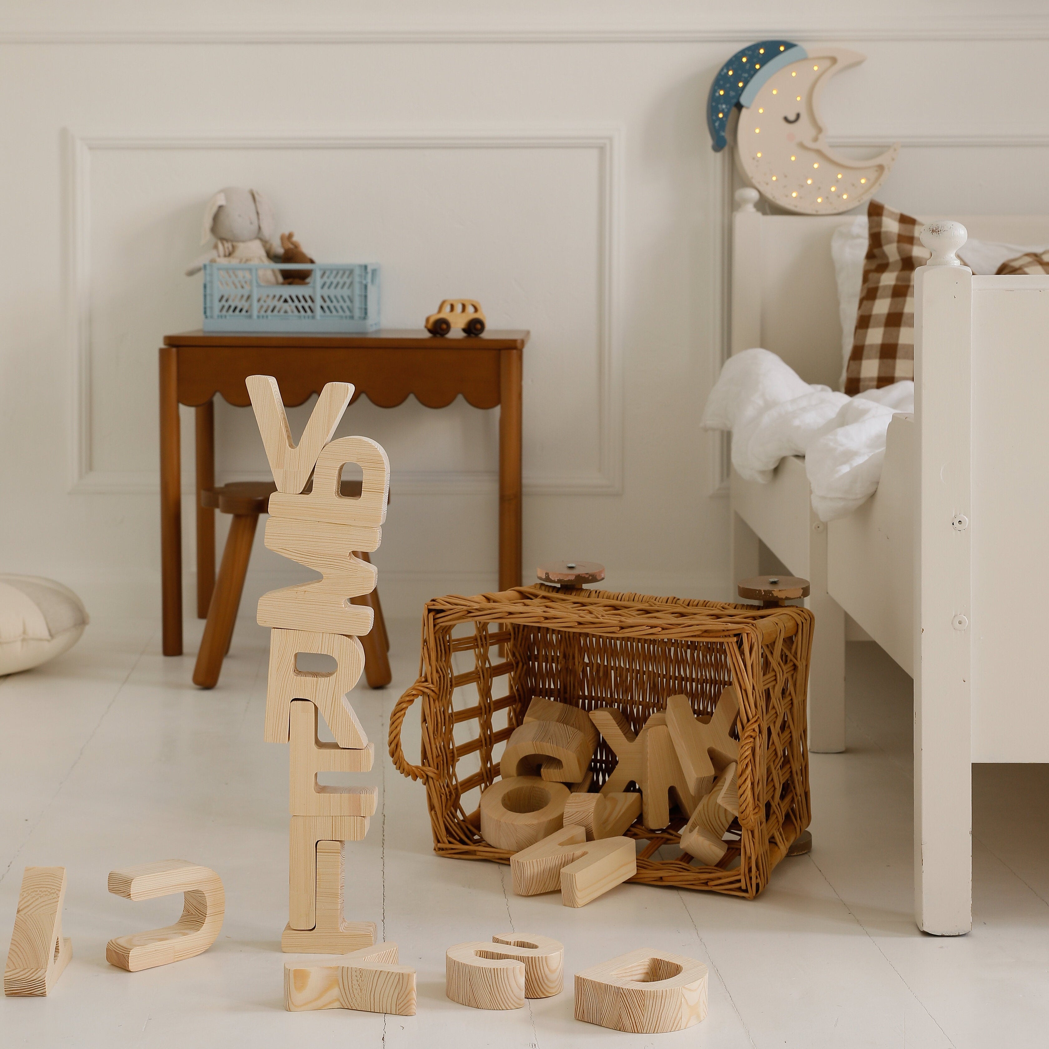 Little Lights alphabet block wood toy in children’s playroom décor setting