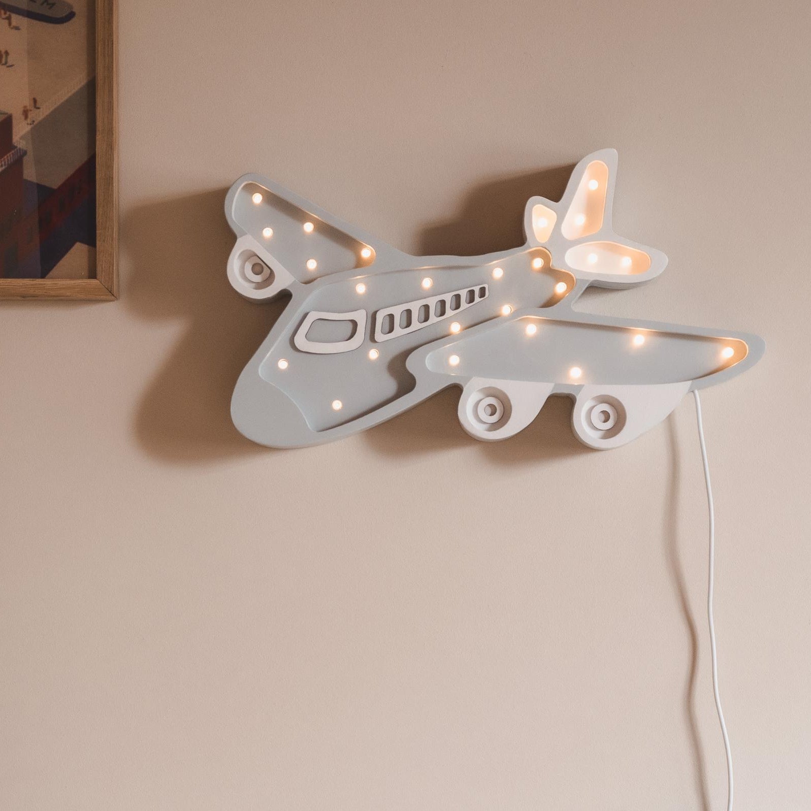 Grey Plane Night Light hung on the wall with Remote and Dimmer by Little Lights