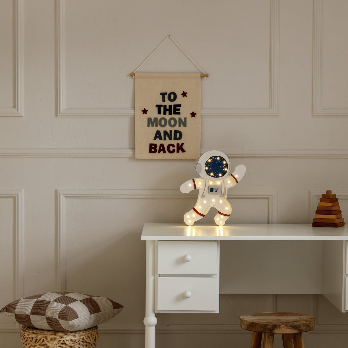 Kids room with the Astronaut Lamp glowing on the desk