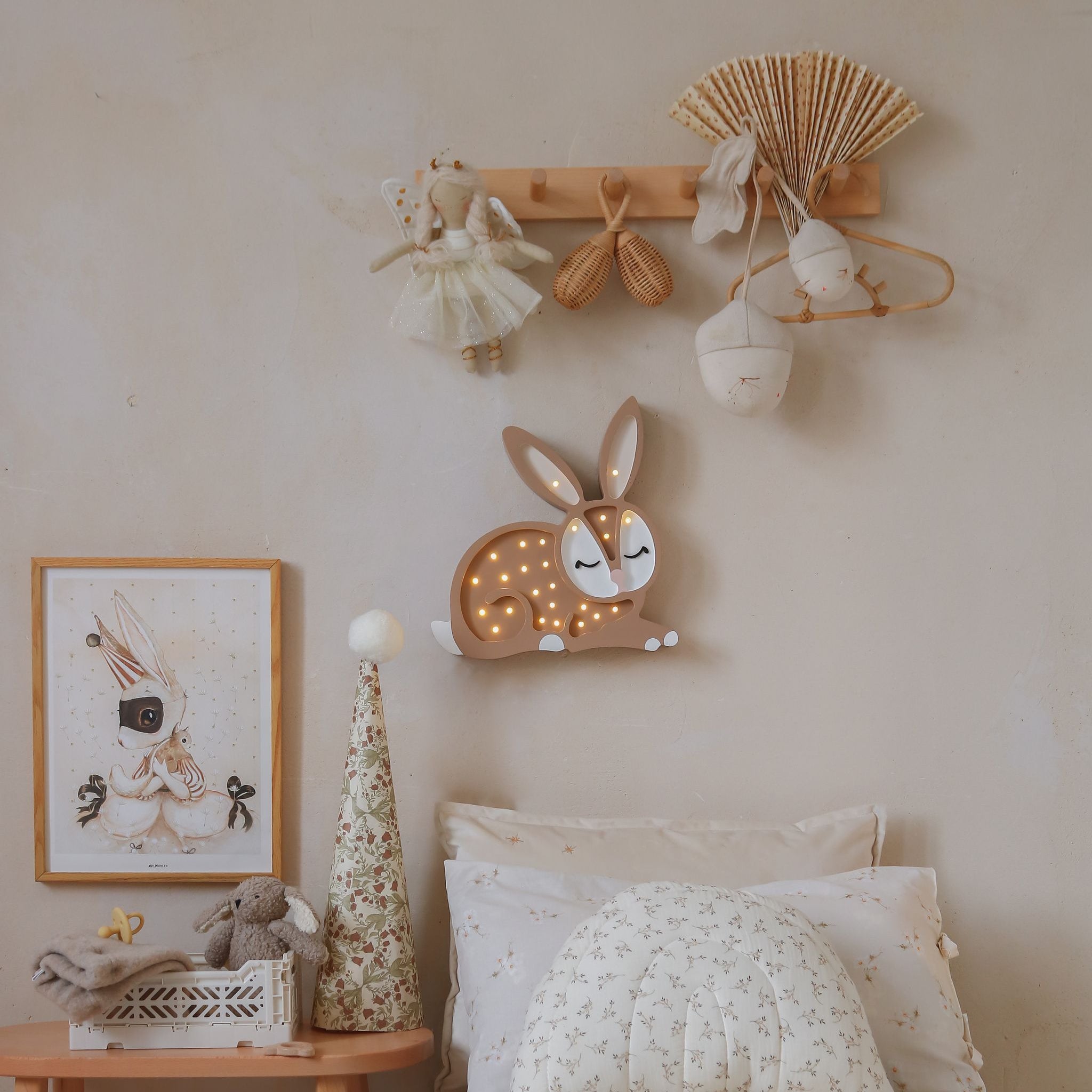 Little Lights Bunny lamp on the wall in a kid's room