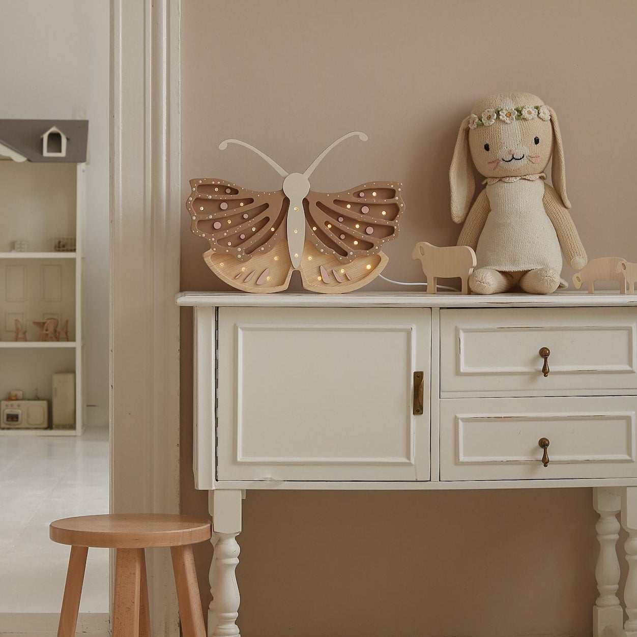 Little Lights Butterfly Lamp on a dresser in a child's room
