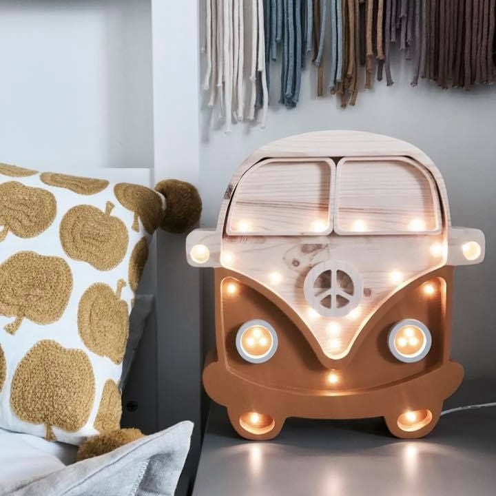 Little Lights Camper Van Night Light glowing in a baby nursery