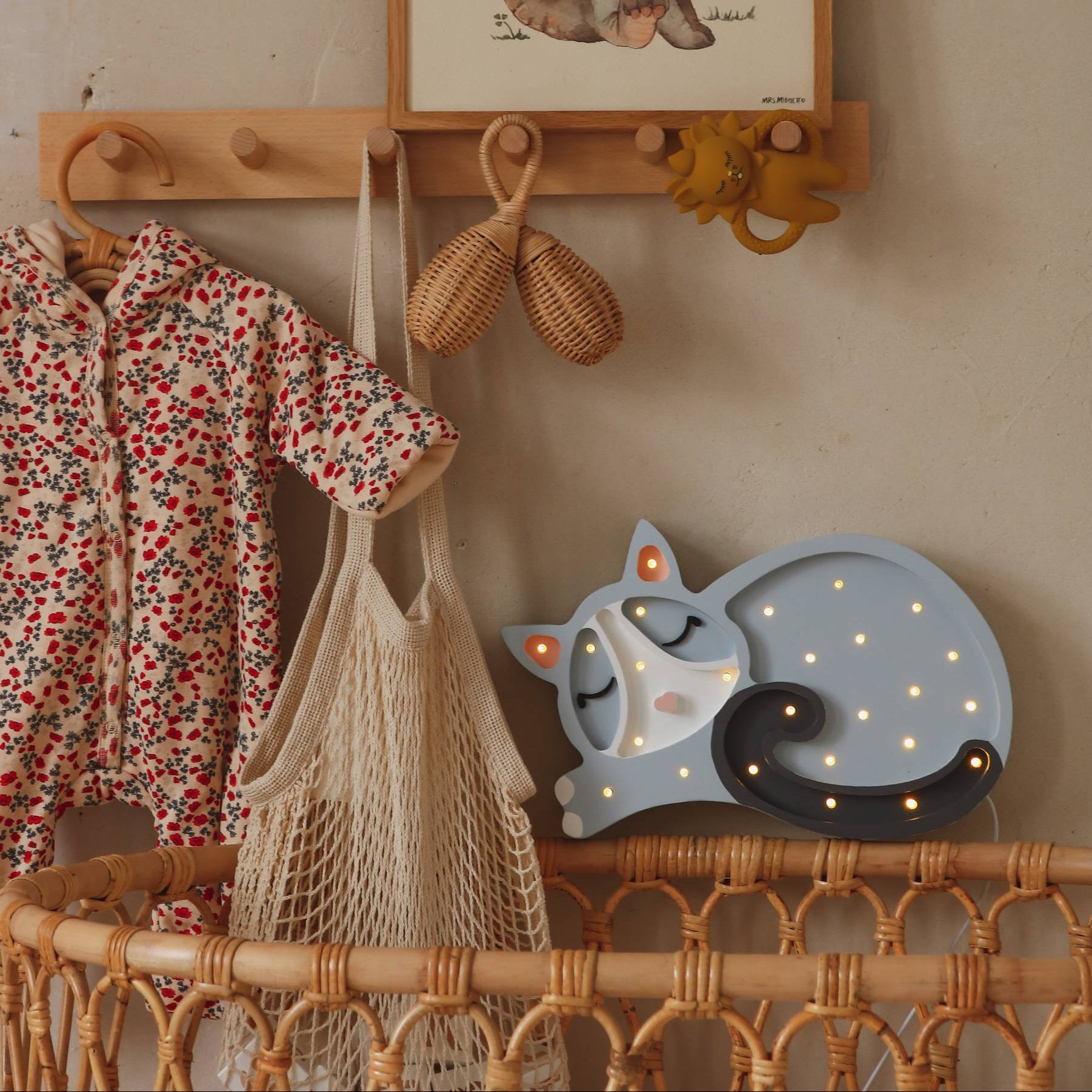 Little Lights Cat Lamp glowing in a baby nursery