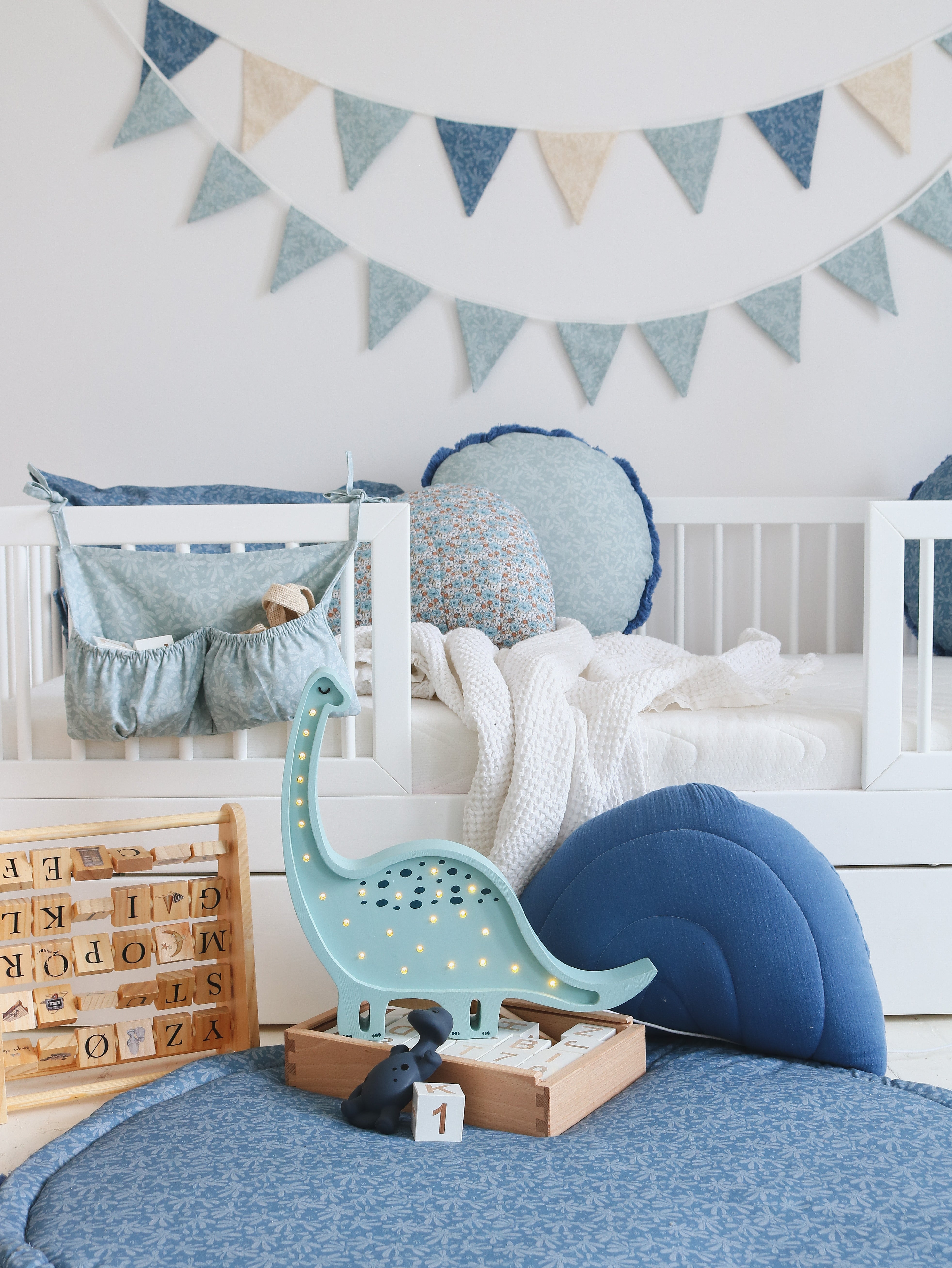 Prehistoric Blue Diplodocus Lamp adding playful light to nursery or playroom