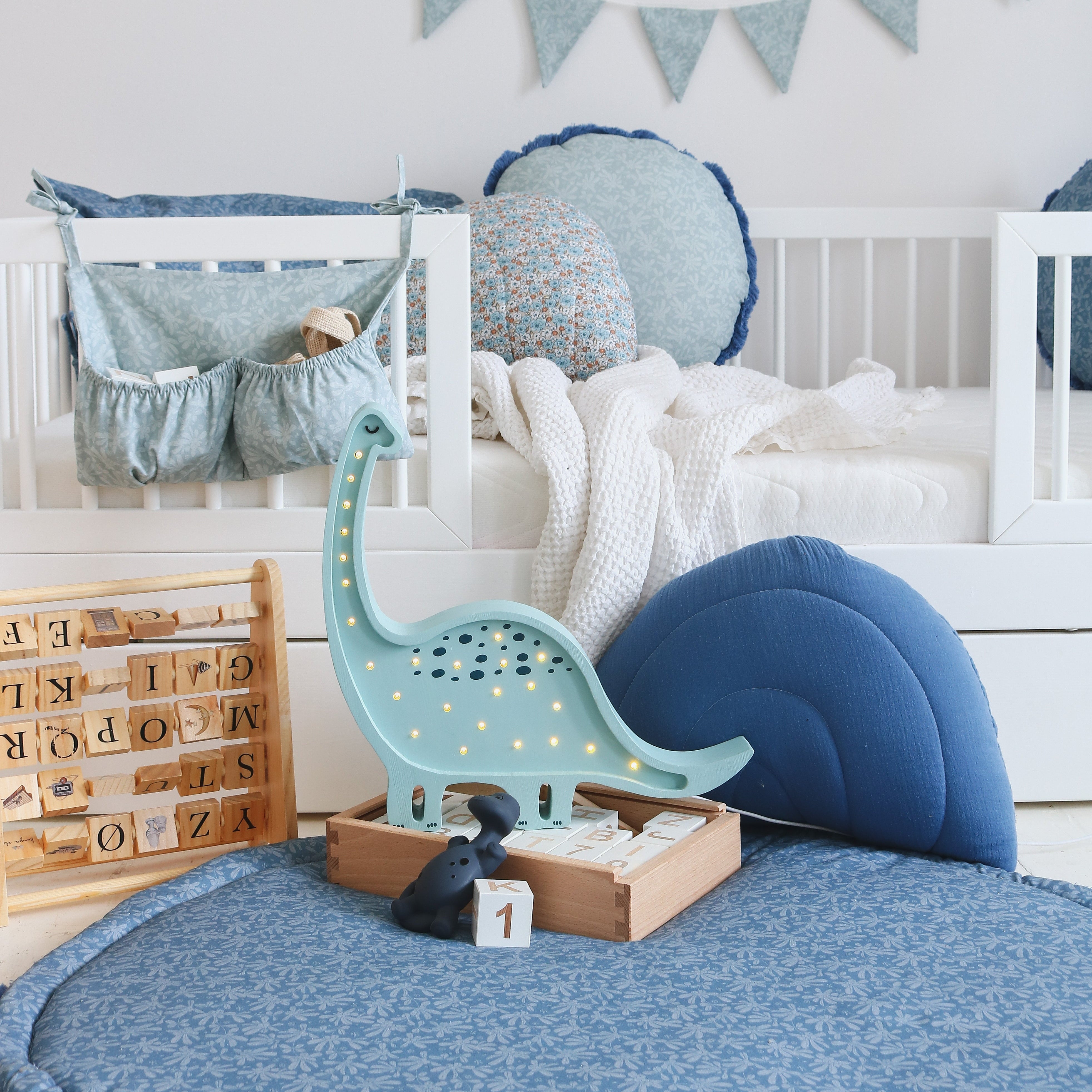 Boy's blue room with Little lights Dino Diplodocus night light