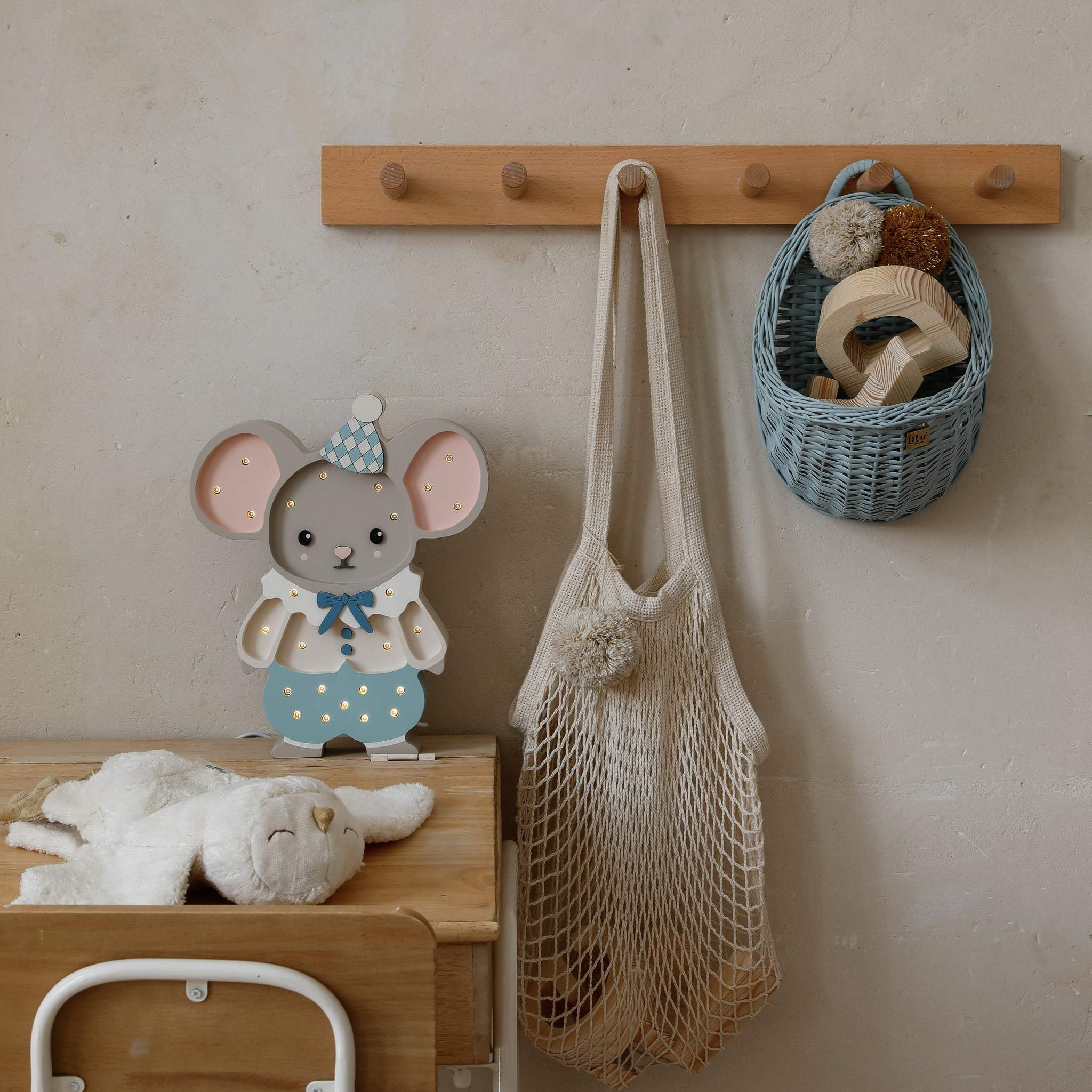 Little Lights Felix the Mouse Blue Lamp on a desk in a kid's room
