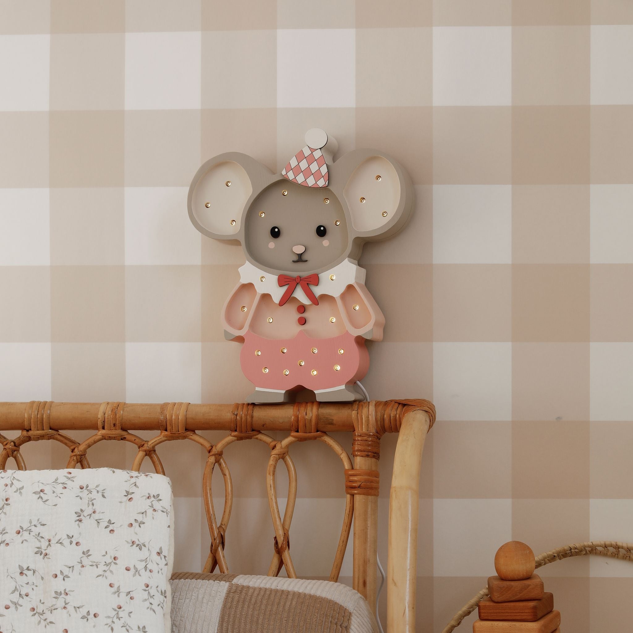 Little Lights Felix the Mouse Pink Lamp by the bed in a kid's room