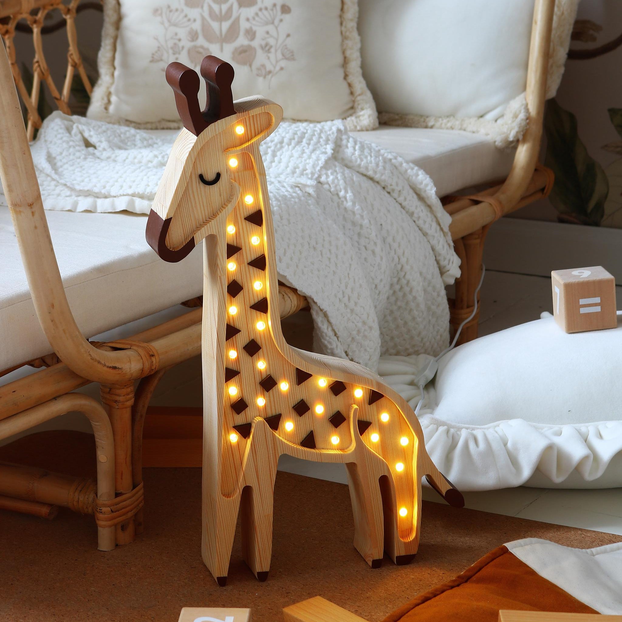Little Lights wooden handmake Giraffe Lamp in a baby nursery