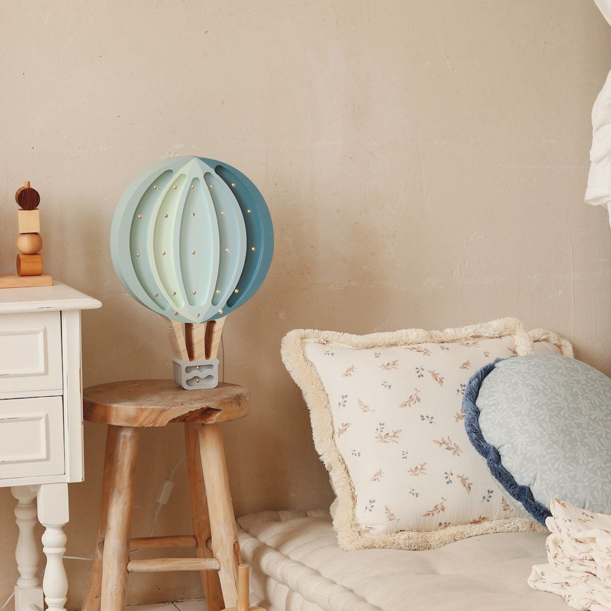 Little Lights Hot Air blue Balloon night light by the bed in a boy's room