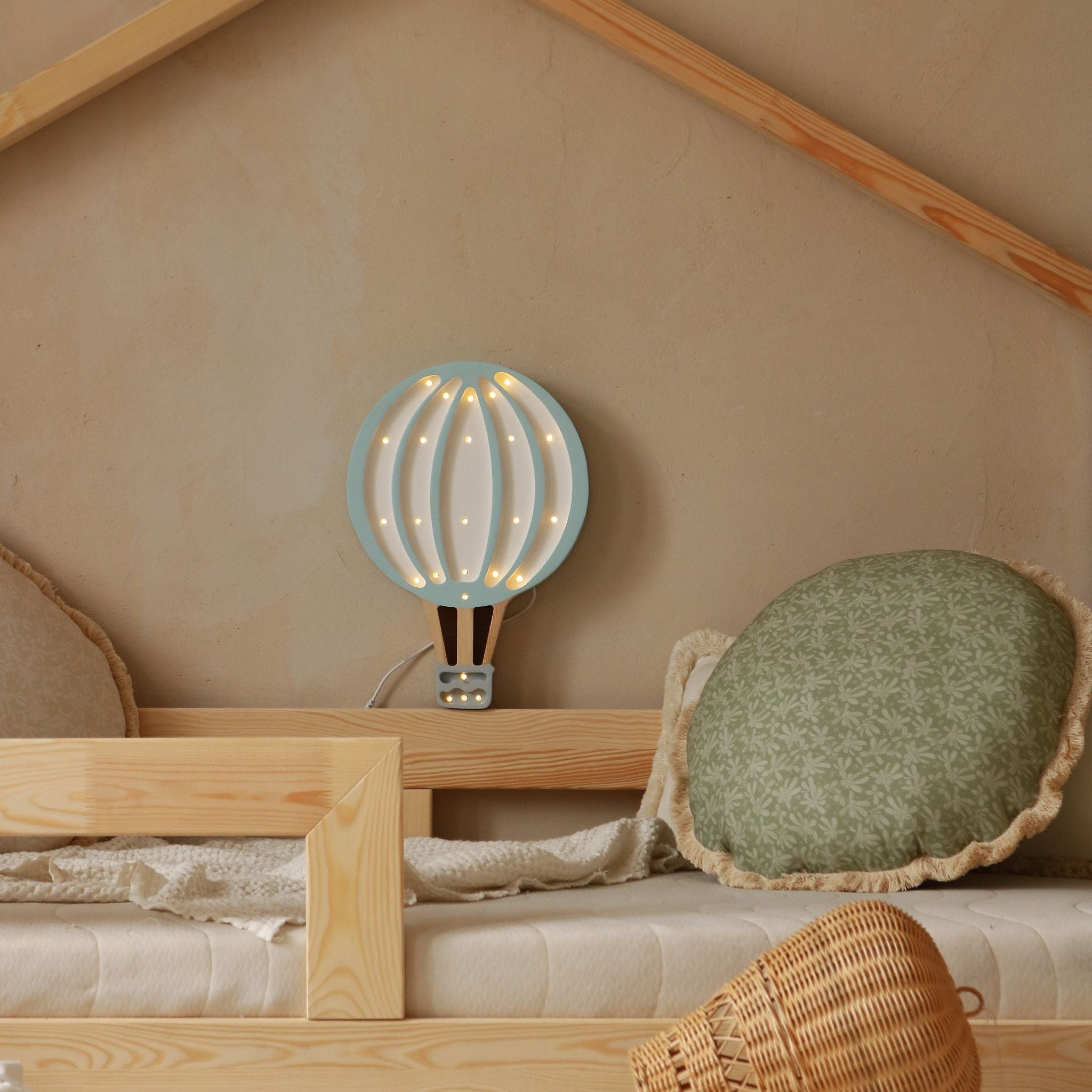 Little Lights Hot Air Balloon lamp blue glowing in a kid's room