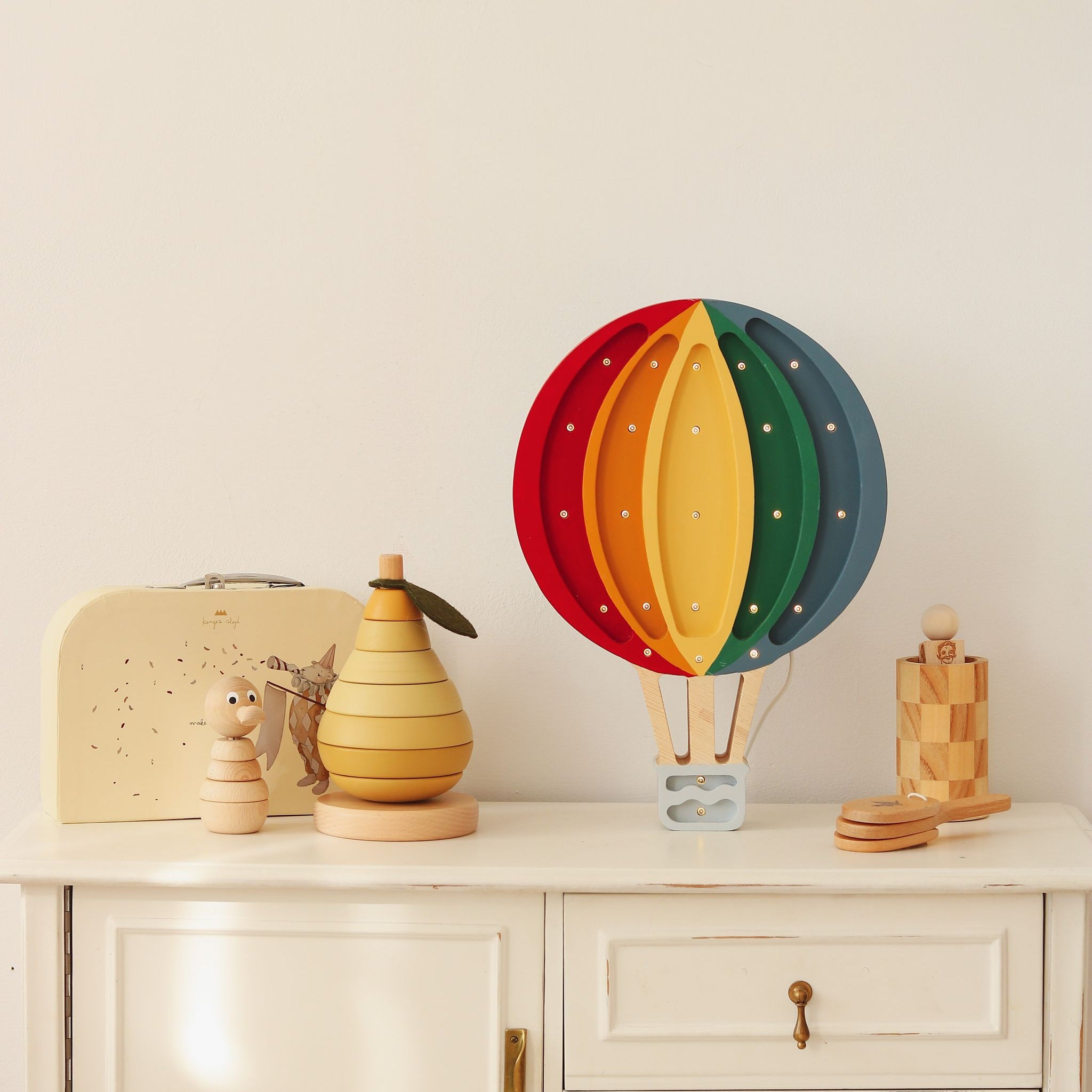 Little Lights Hot Air Balloon night light Circus Joy on a dresser in a kid's room