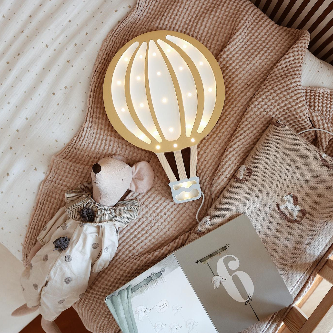 Little Lights Hot Air Balloon mustard lamp in a boy's room