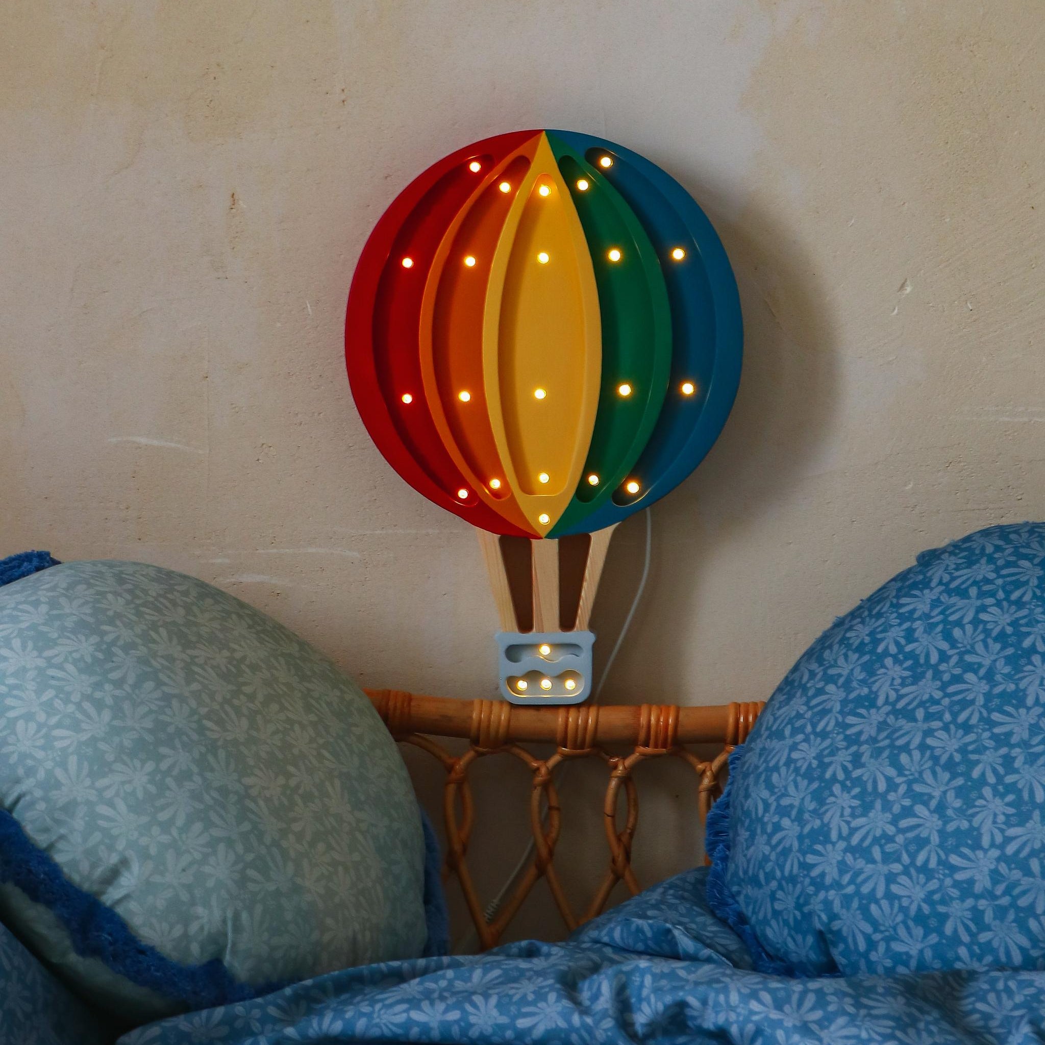 Little Lights Hot Air Balloon Circus joy lamp by the bed in a kid's room