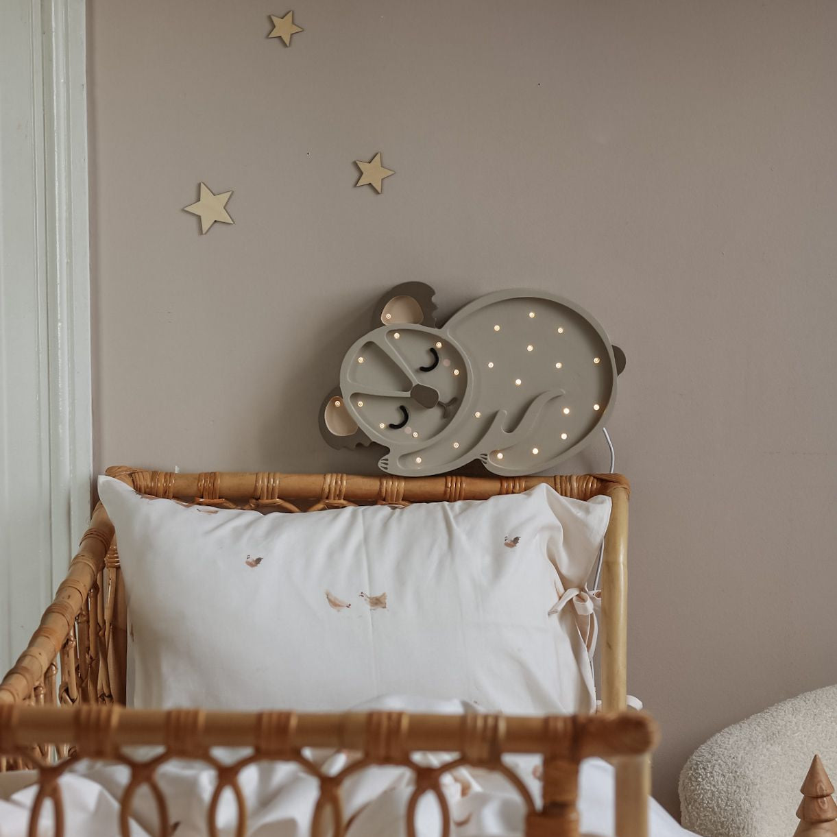 Little Lights Koala Bear Lamp by the bed in a neutral kid's room