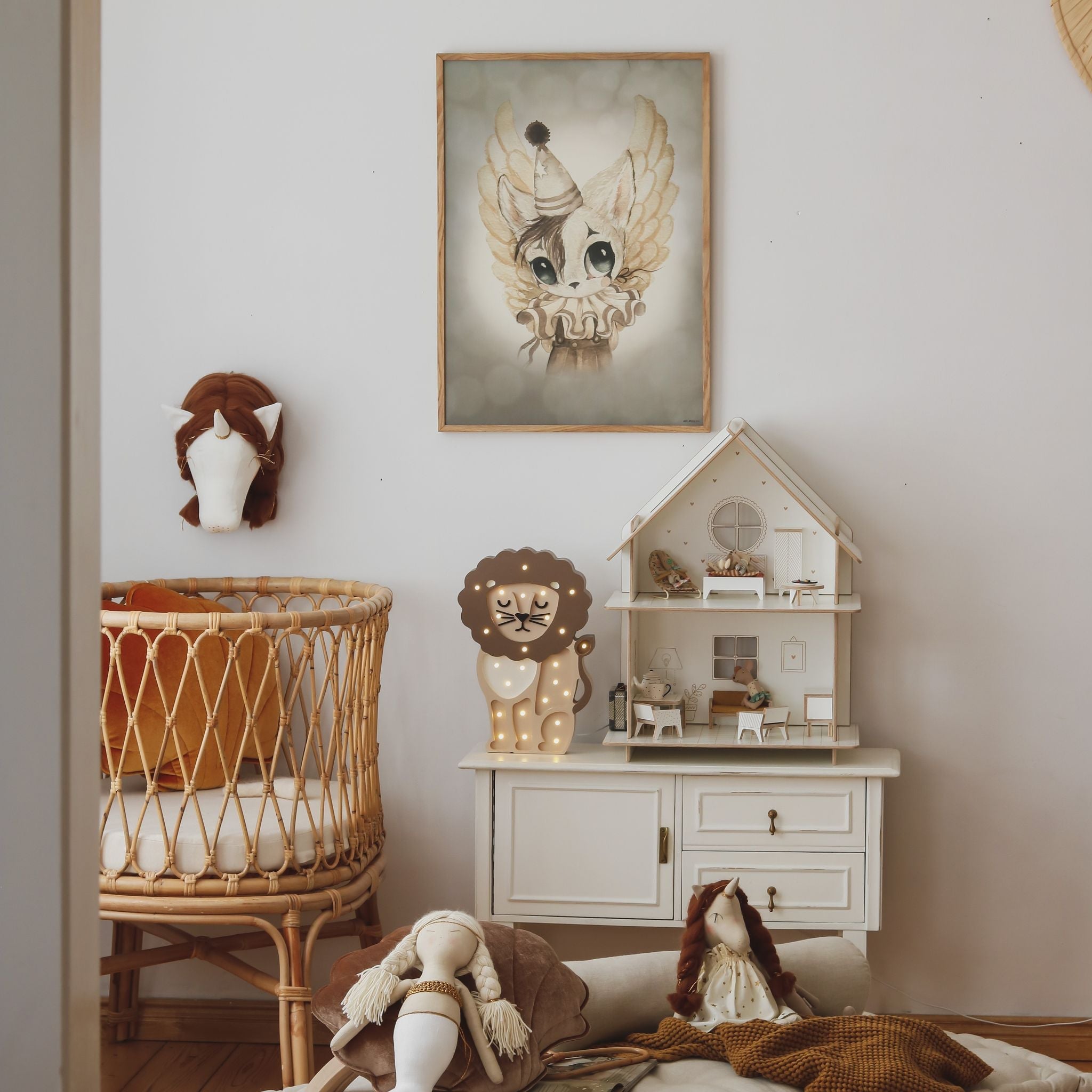 Nursery room with toys and wooden Lion night light
