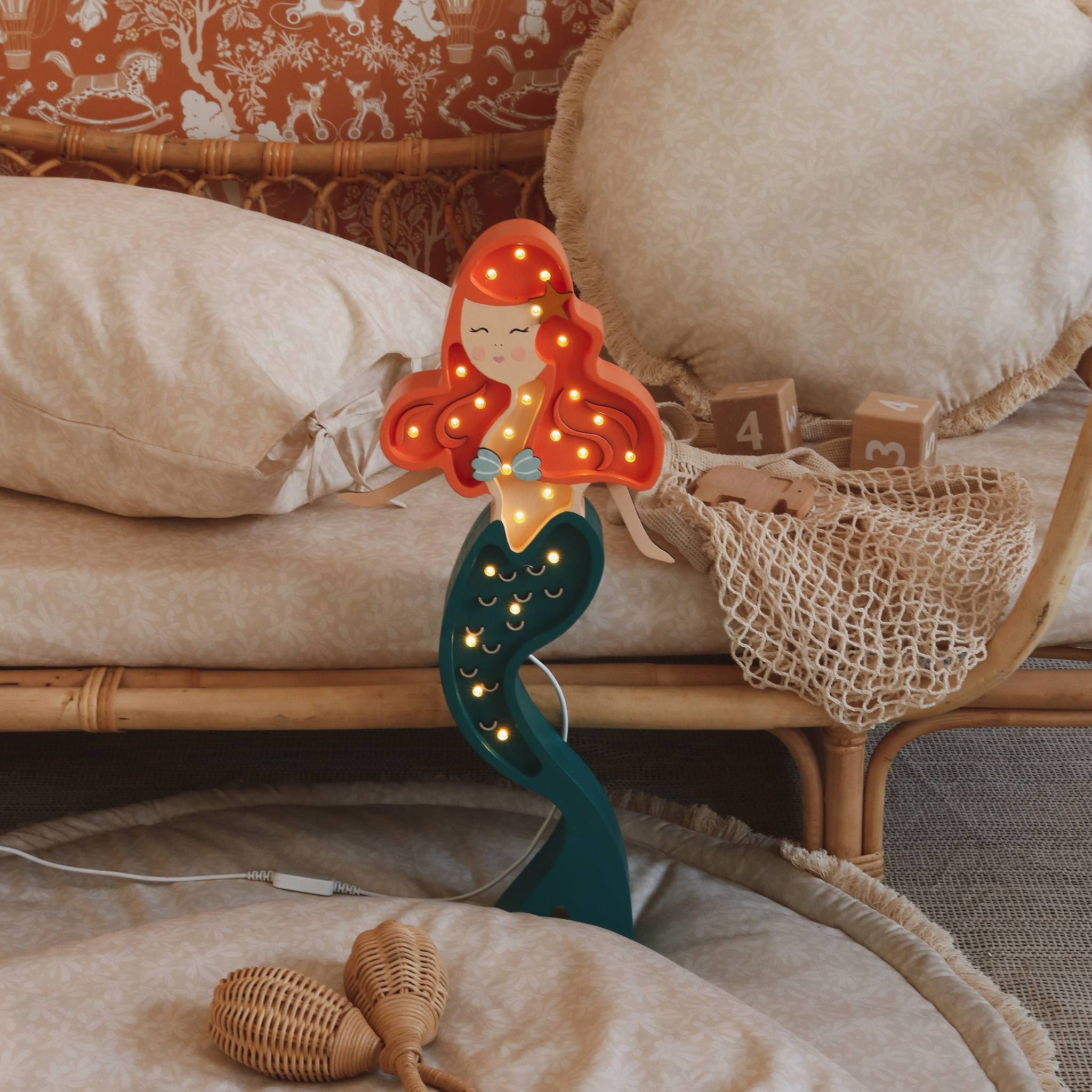 Little Lights ginger Mermaid Lamo be the bed in a girl's room
