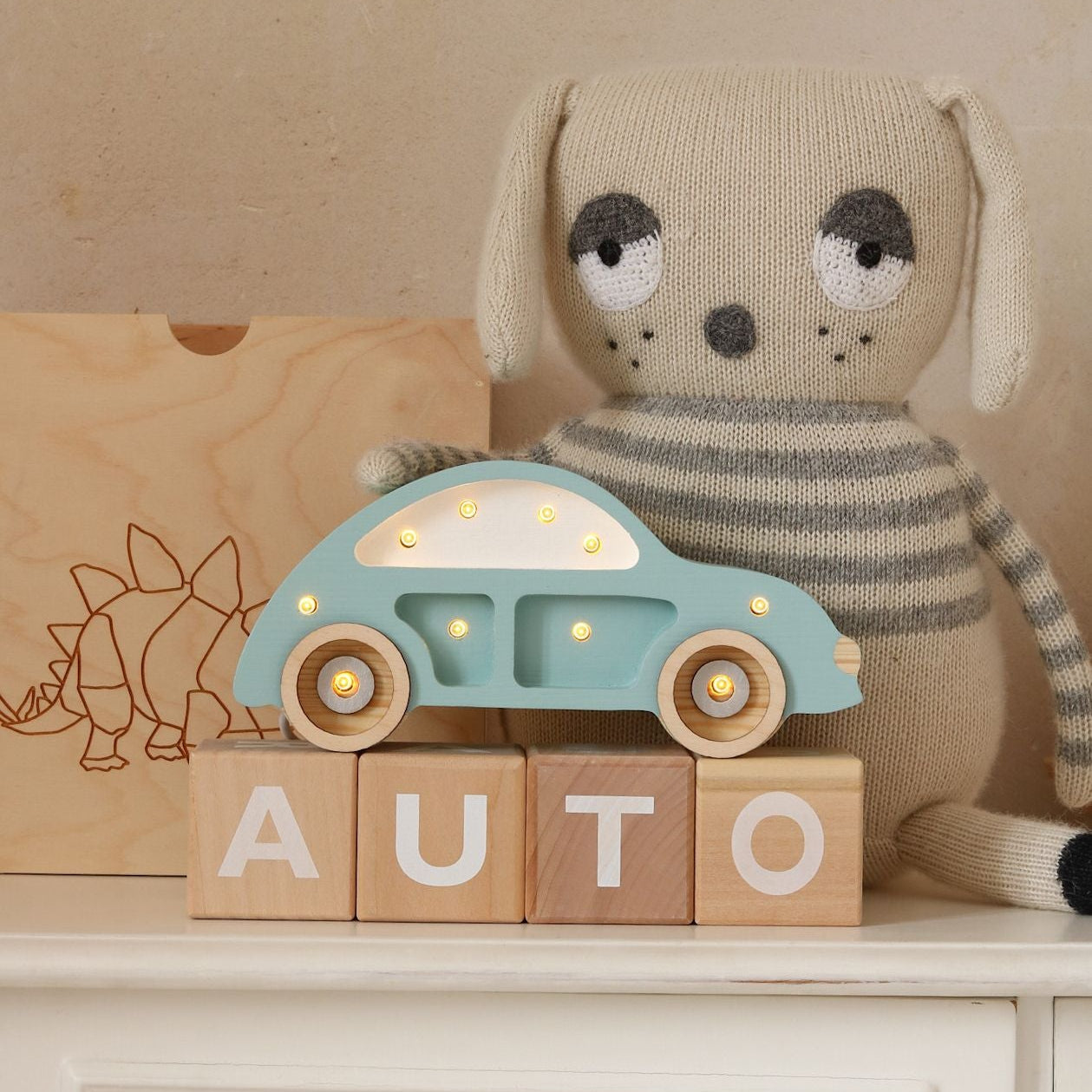 Little Lights blue Mini Beetle night light in a boy's nursery