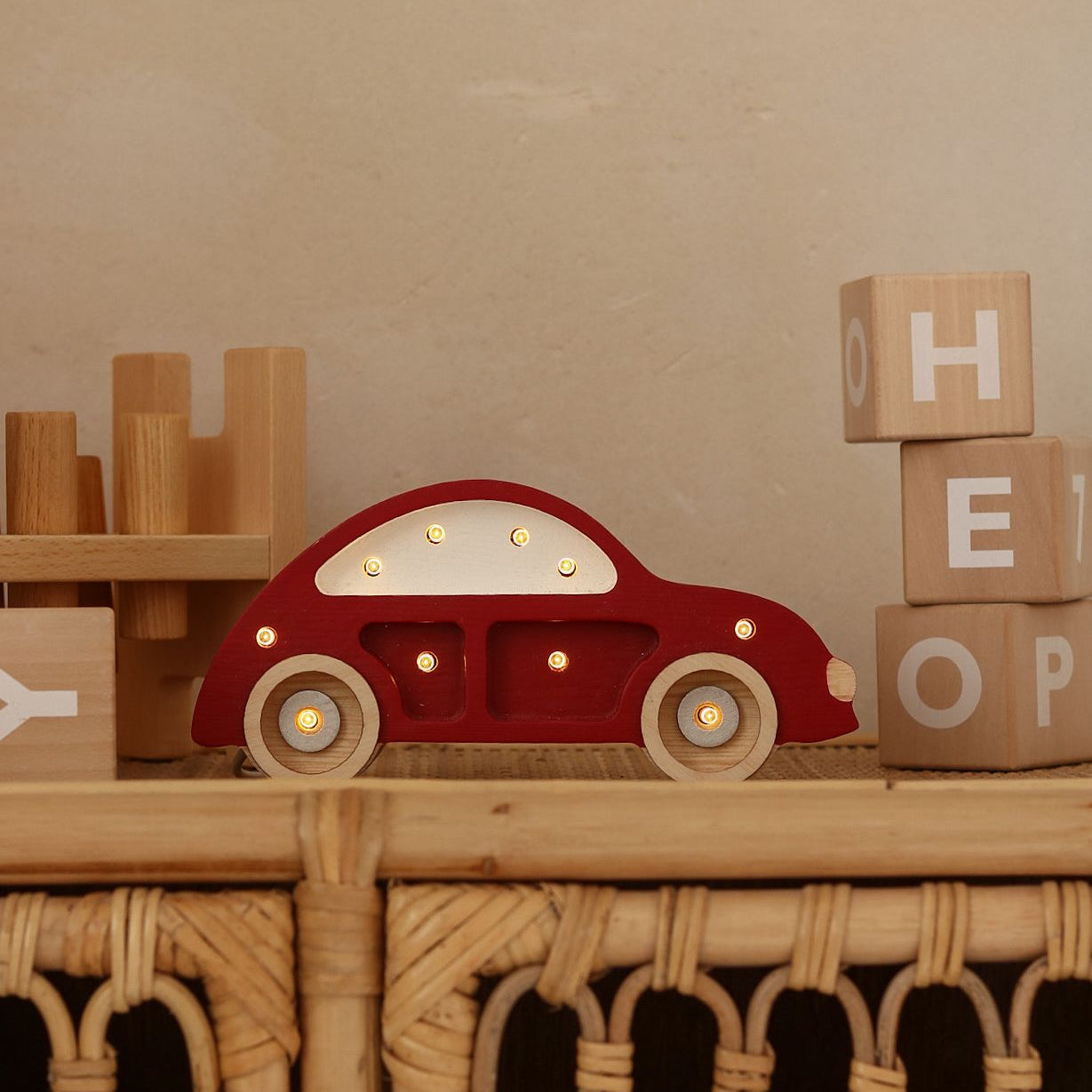 Little Lights red Mini Beetle Car on a dresser in a kid's room