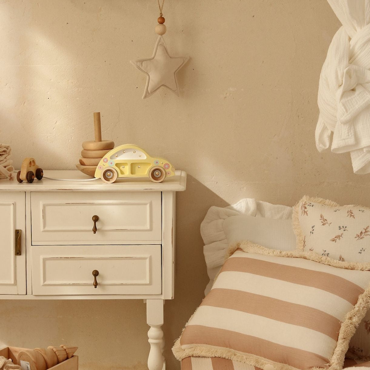 Little Lights butter yellow Mini Beetle Car Night Light on a dresser in a girl's room