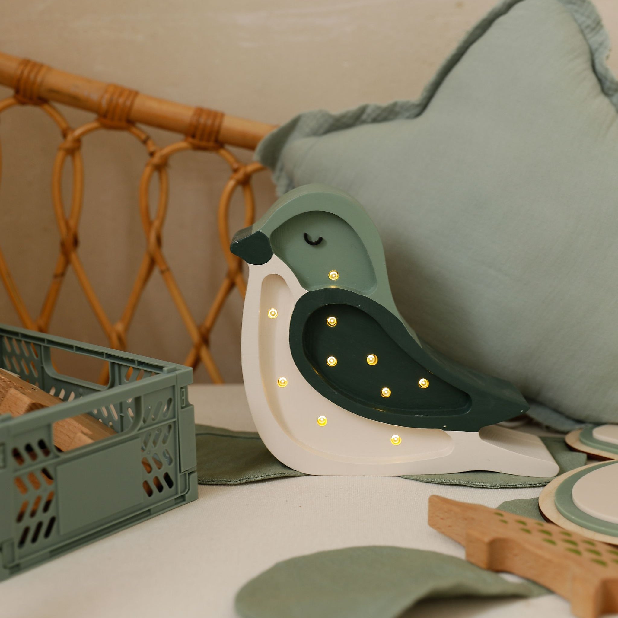Little Lights green Mini Bird lamp in a baby nursery