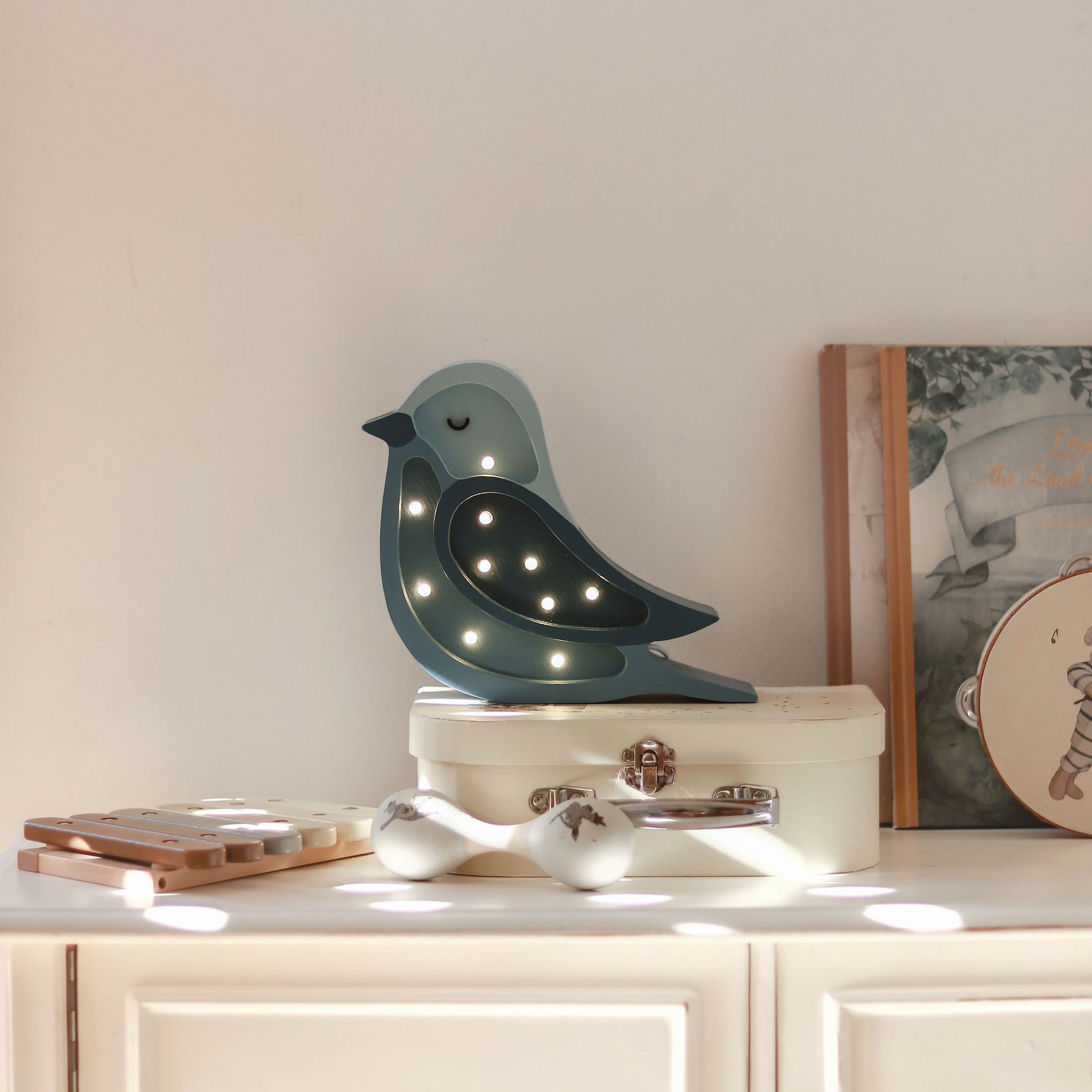 Little Lights blue Mini Bird Night Light in a baby room