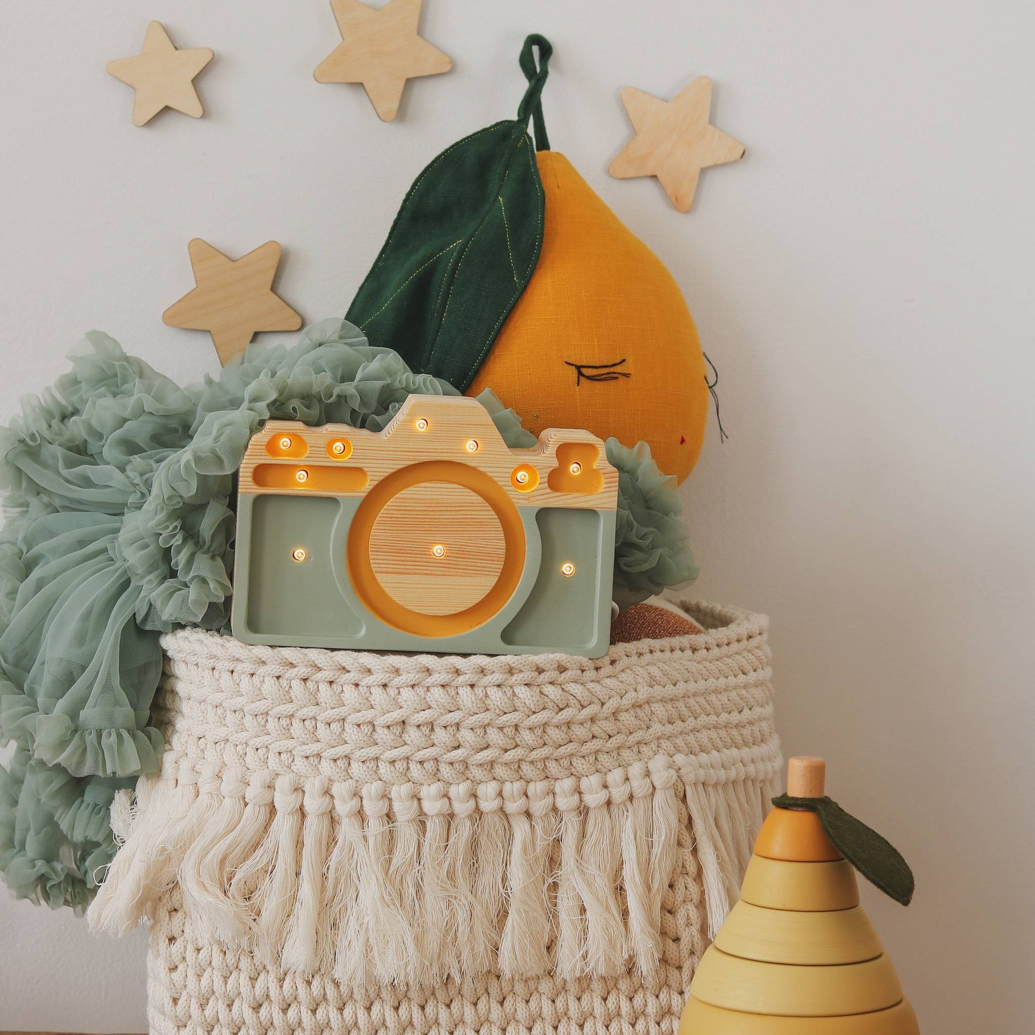 Little Lights wooden khaki Camera lamp in a kid's playroom