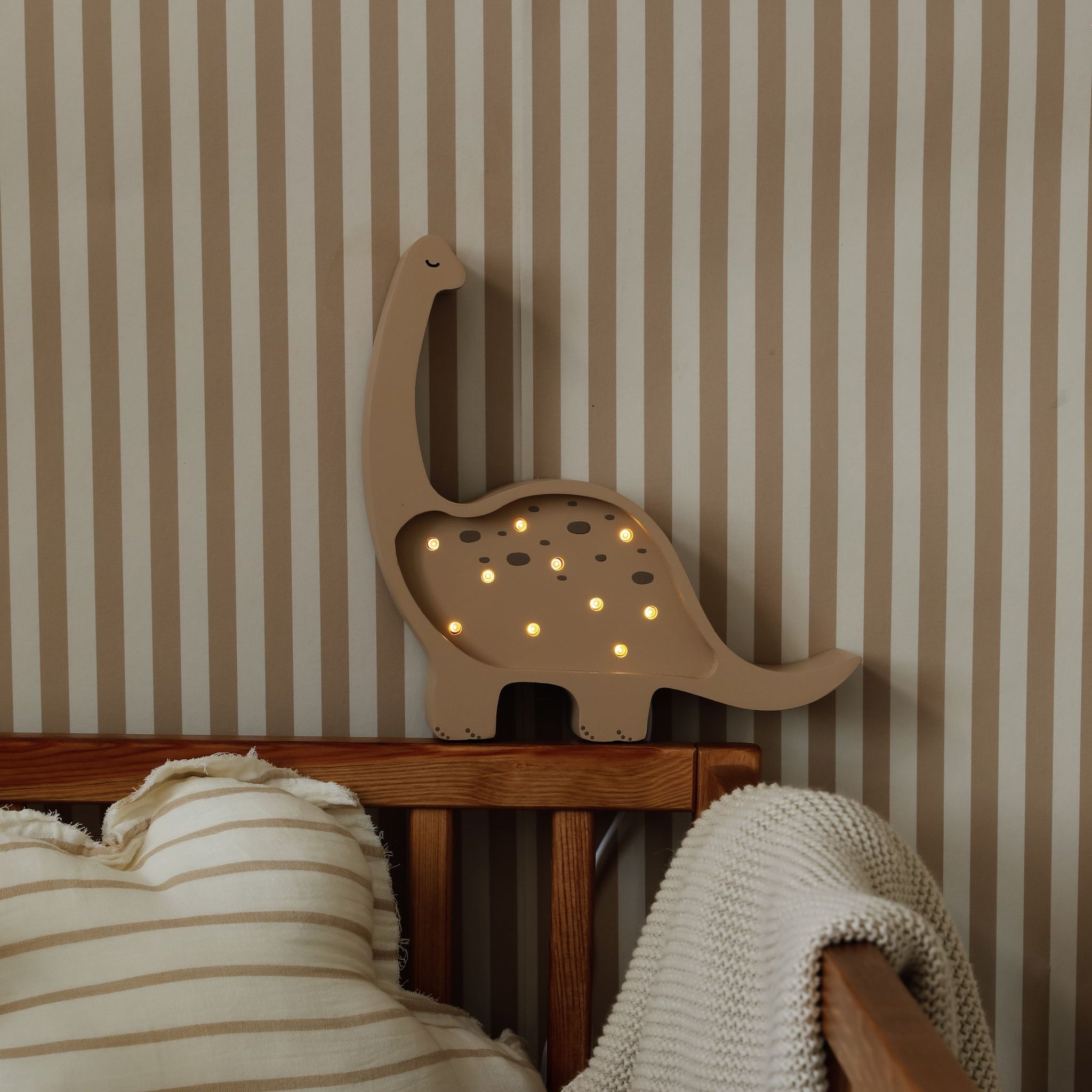 Little Lights Mini Dino cappuccino night light for a baby shower gift