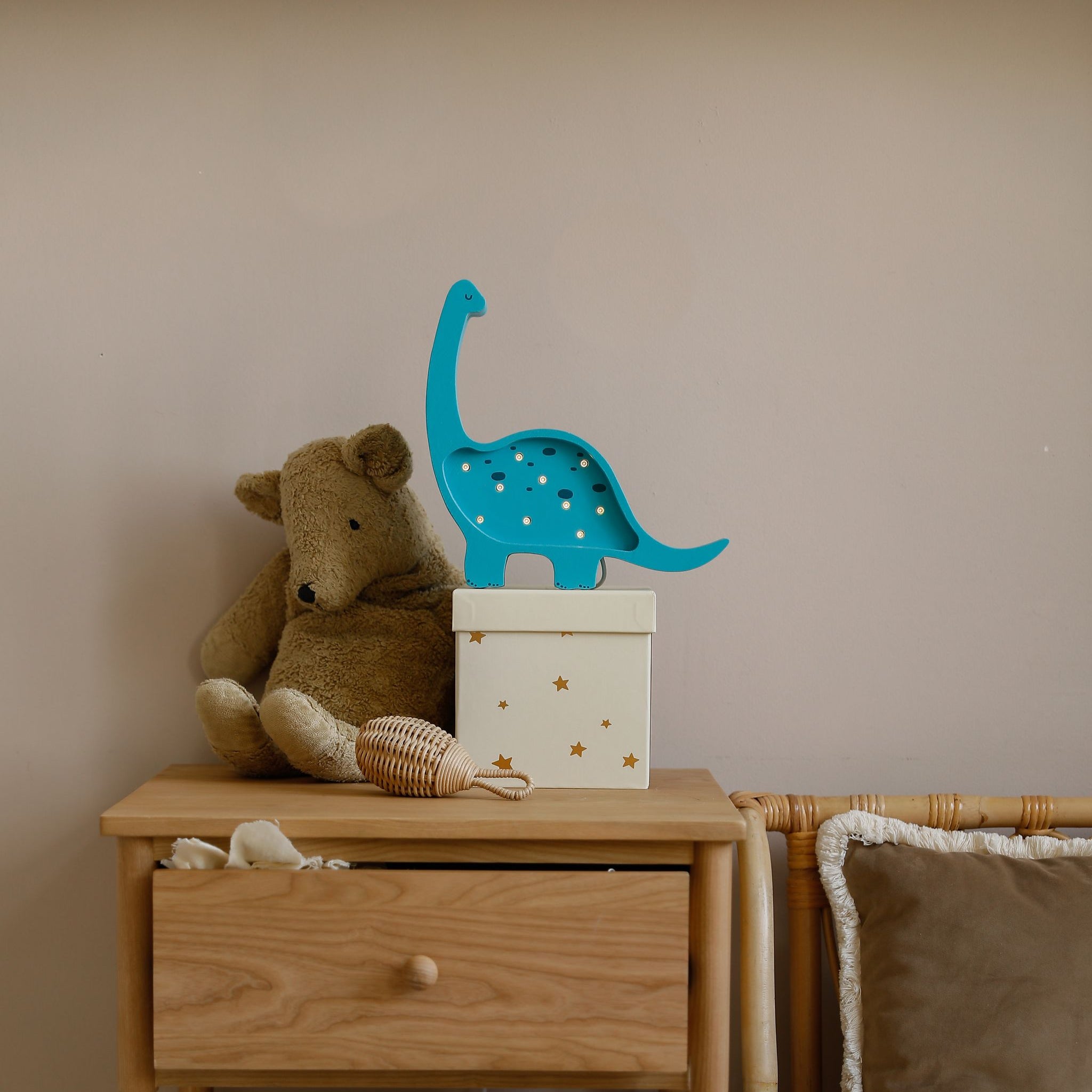 Little Lights blue Mini Dino lamp in a baby boy room