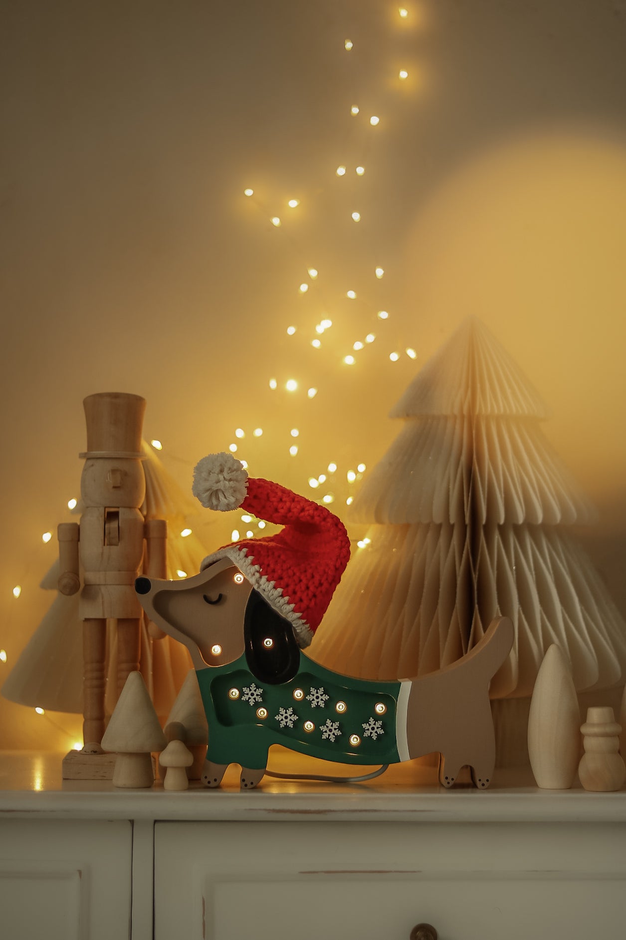 Little Lights Mini Holiday Puppy Lamp in Christmas Snowflake — handmade dimmable wooden LED night light, a cozy nursery gift for the holidays