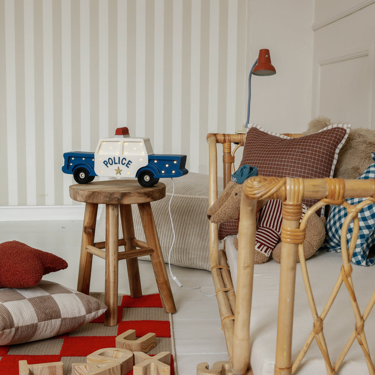 Police Car Lamp in toddler's room glowing softly by the bed