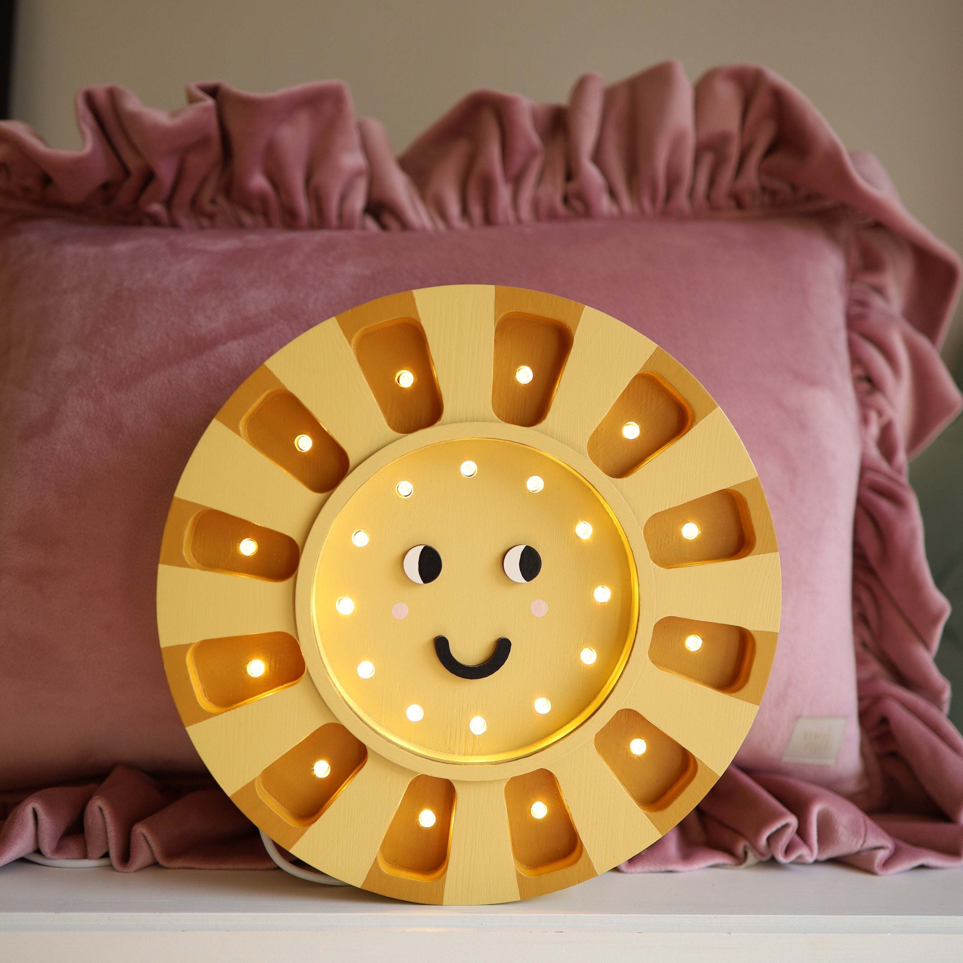 Sunshine Lamp glowing in nursery – decorative kids night light for baby’s room.