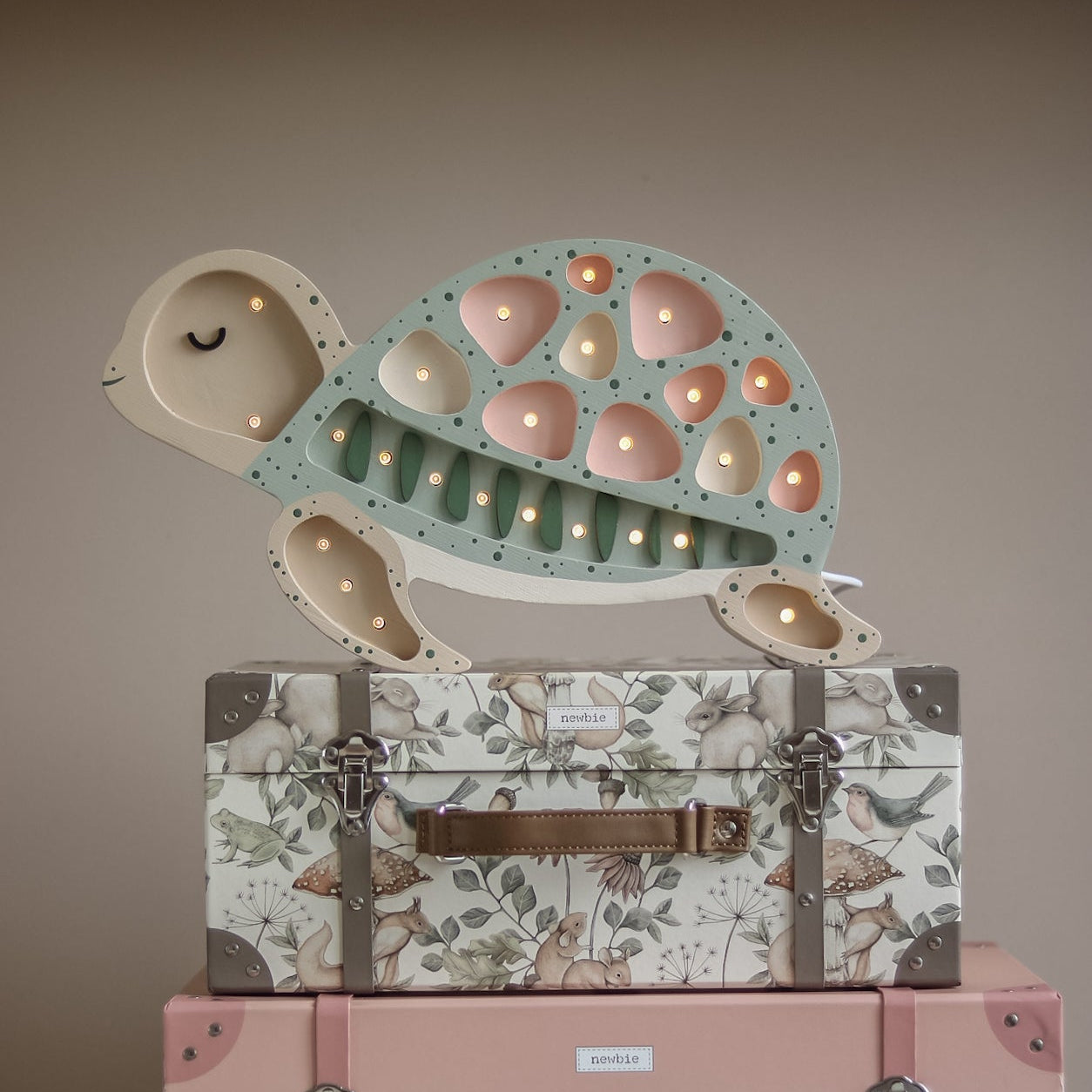 Little Lights pink Turtle Lamp in a girl's room