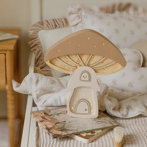 Close-up of Mushroom House Lamp showing handmade wooden details and smooth finish.