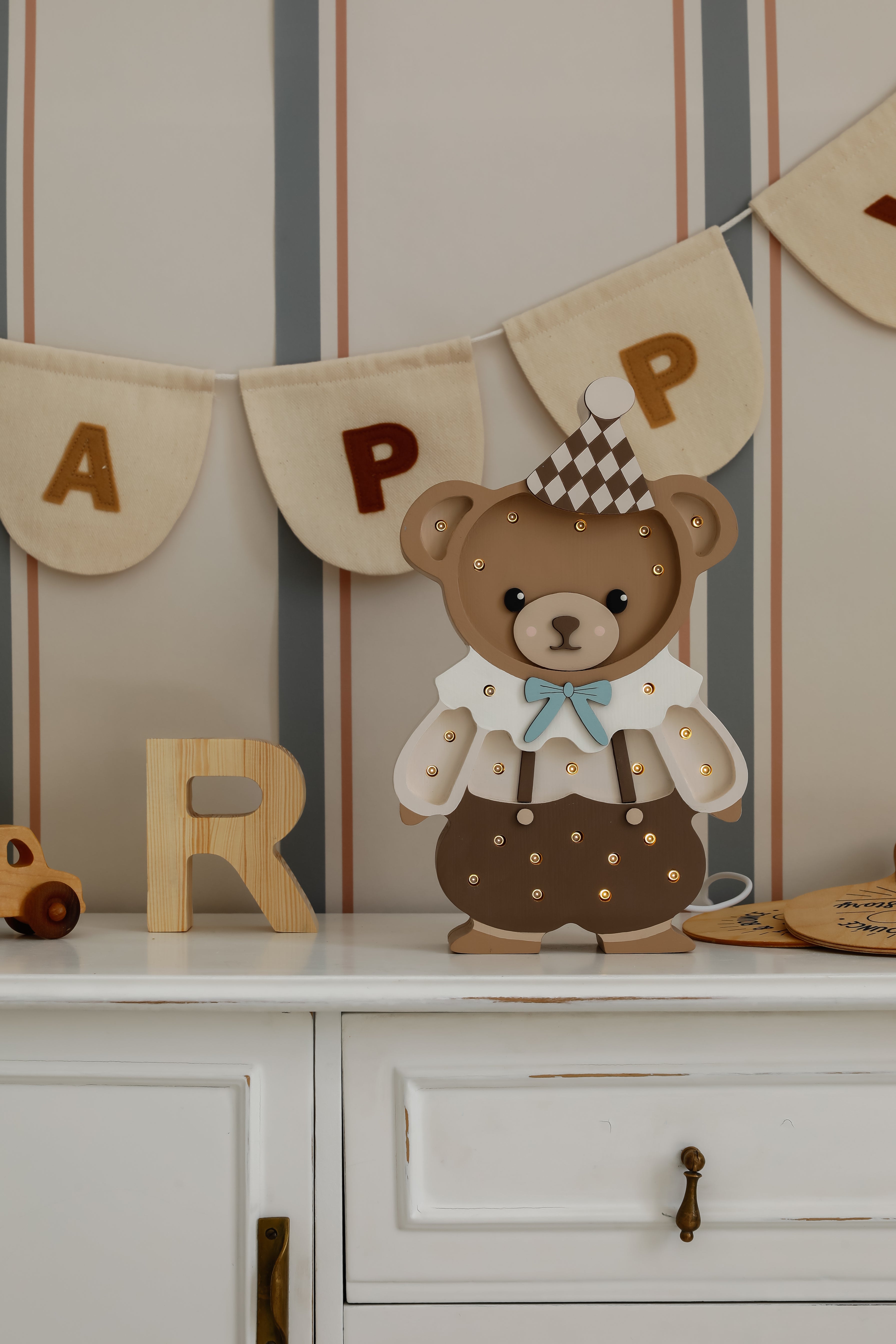Handcrafted wooden Theo the Bear Lamp by Little Lights, dimmable LED kids’ room lamp with remote control, ideal for nursery décor